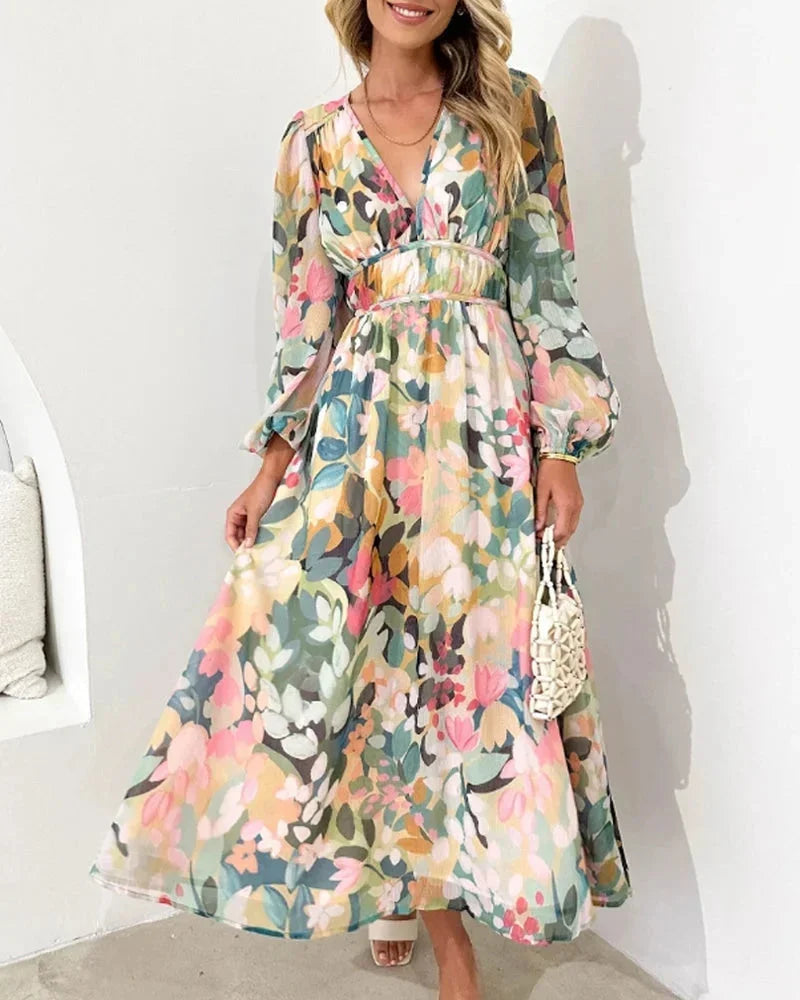 Women's floral maxi dress with long puff sleeves and v-neckline