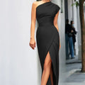 Black asymmetrical neck maxi dress for women, featuring a front slit and soft, breathable fabric for comfortable wear.