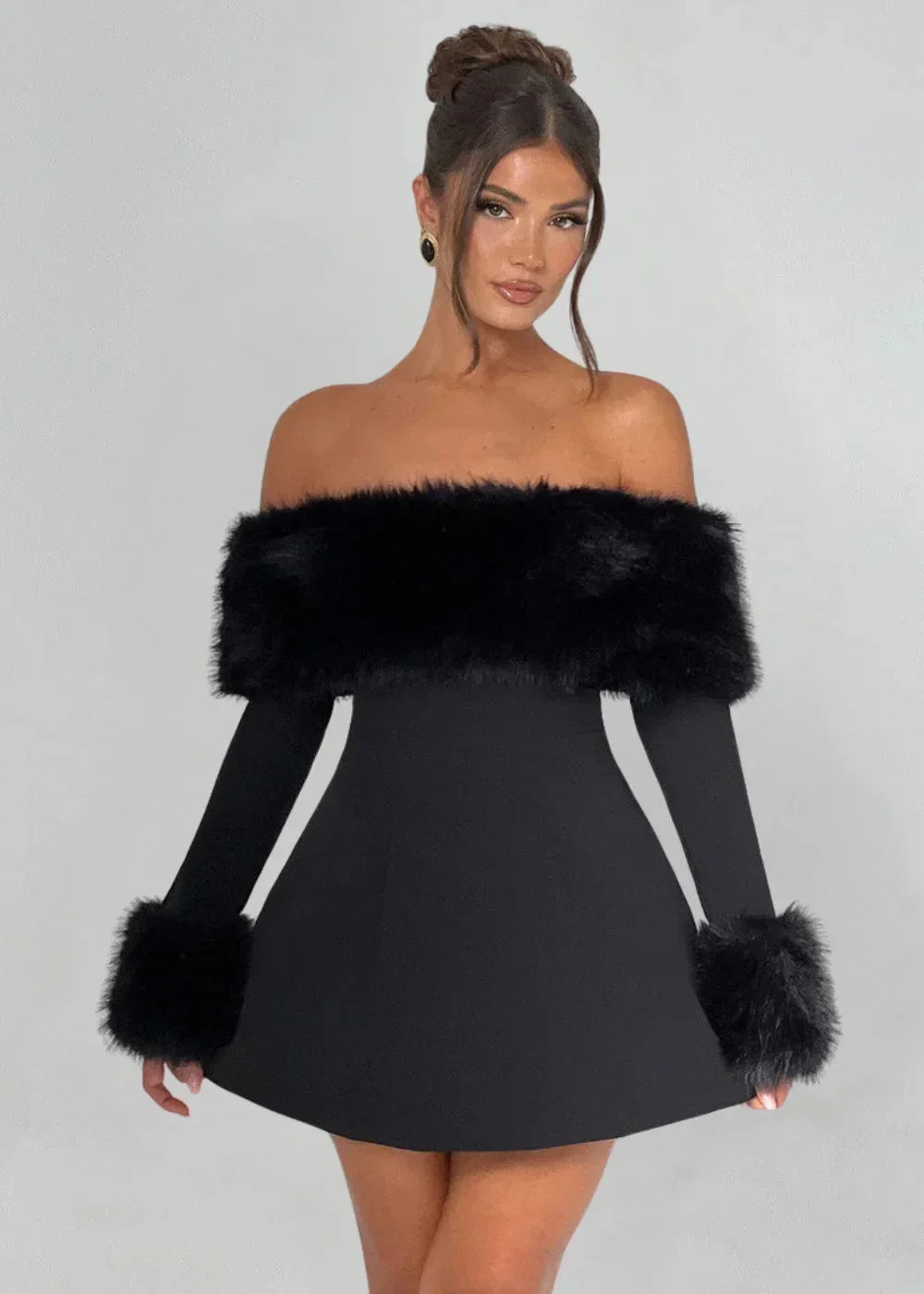 Off-shoulder mini dress in black with soft fur details, made from a lightweight fabric for a comfortable fit.
