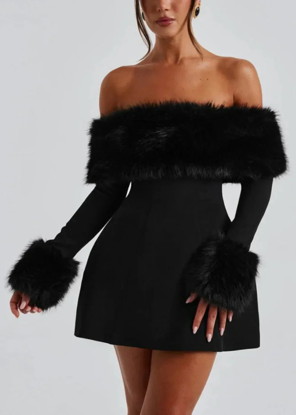 Women’s black off-shoulder mini dress featuring soft fur details and a fitted design, perfect for casual outings or evening…