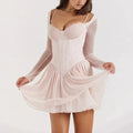 Women’s blush pink mesh mini dress featuring delicate lace detailing and a fitted silhouette, perfect for casual outings.