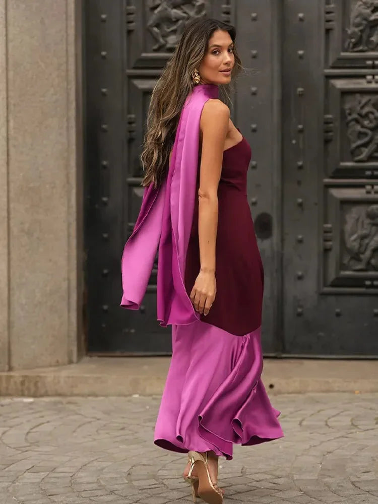 Women’s burgundy and pink strapless asymmetric midi dress with shawl, crafted from soft fabric with a flowing silhouette.
