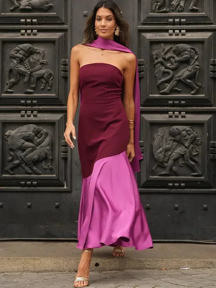 Women’s strapless asymmetric midi dress in burgundy and pink, featuring a soft fabric and matching shawl for added style.