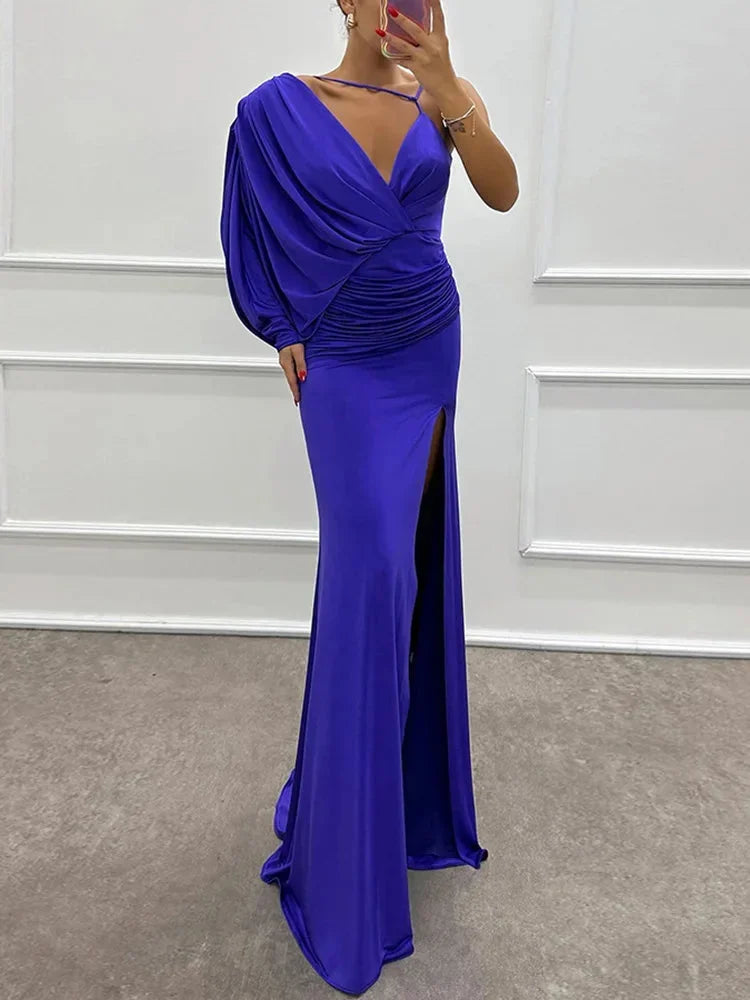 Elegant one-shoulder maxi dress in soft fabric, featuring a draped design and a stylish side slit for added flair.