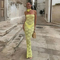 Yellow women's fitted lace maxi dress with spaghetti straps, featuring intricate lace detailing and a flowing silhouette.