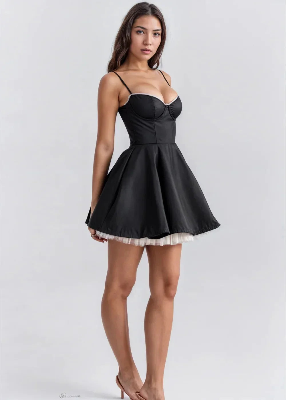 Flared mini dress for women with a fitted bodice, delicate straps, and lightweight fabric ideal for warm weather.