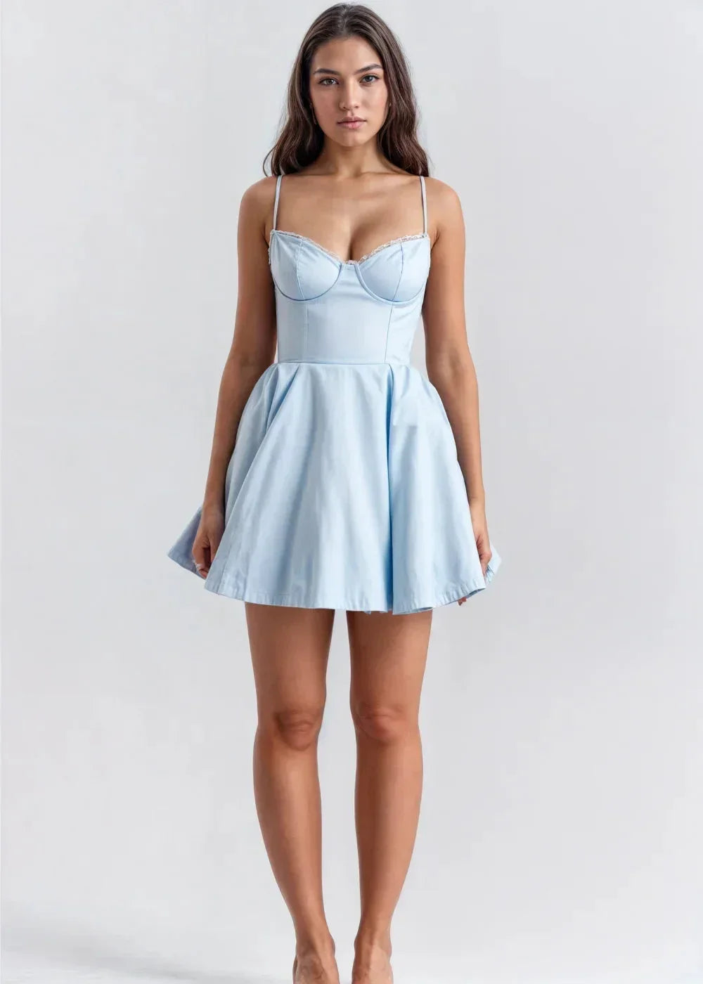 Blue flared mini dress featuring a fitted bodice, delicate straps, and made from lightweight, breathable fabric.