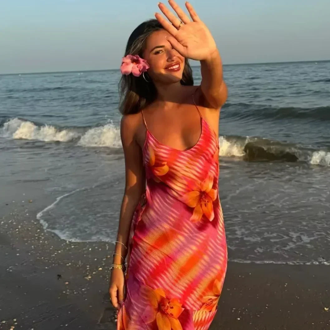 Floral beach maxi dress for women featuring a lightweight fabric and a flowing silhouette, perfect for warm weather…