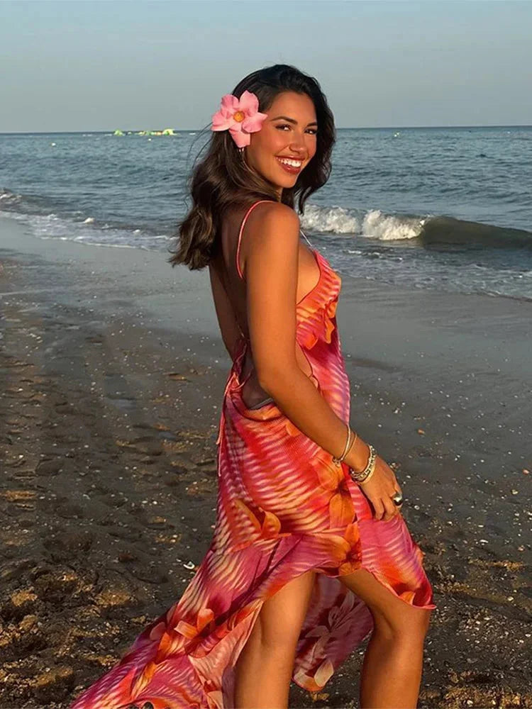 Women’s floral beach maxi dress with a flowing silhouette, made of lightweight fabric, perfect for summer outings.