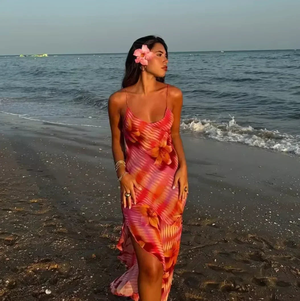 Women’s floral beach maxi dress in lightweight fabric, featuring a flowing silhouette and vibrant floral design for summer…