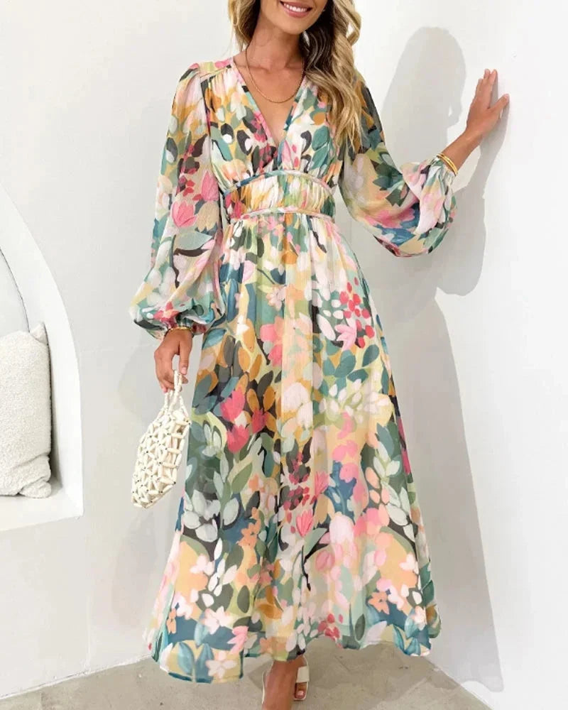 Women’s floral maxi dress with long puff sleeves, v-neckline, made from soft cotton blend, perfect for casual outings.