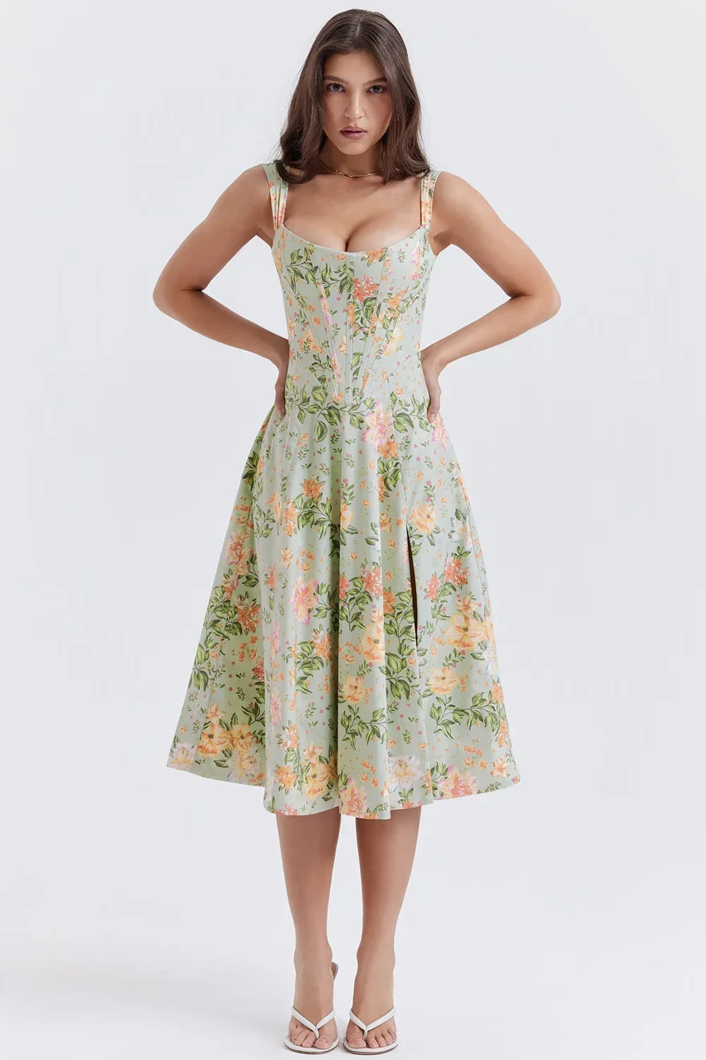 Green women's floral off-shoulder midi dress featuring a fitted bodice and lightweight fabric for comfort and style.