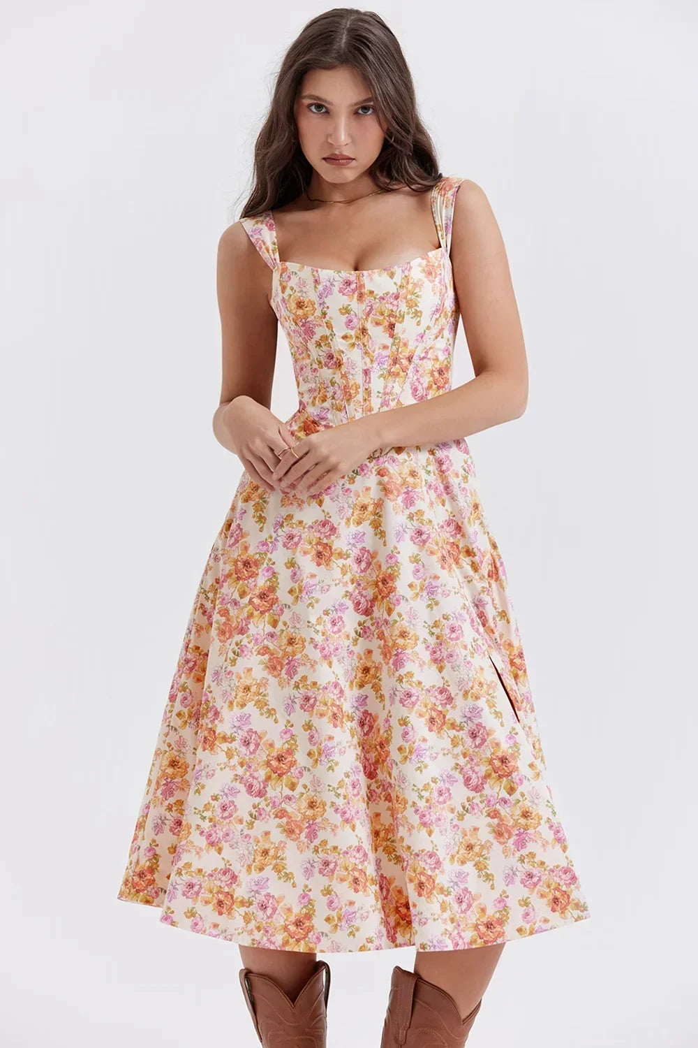 Pink off-shoulder midi dress for women, featuring a fitted bodice and floral print, crafted from soft, breathable fabric.