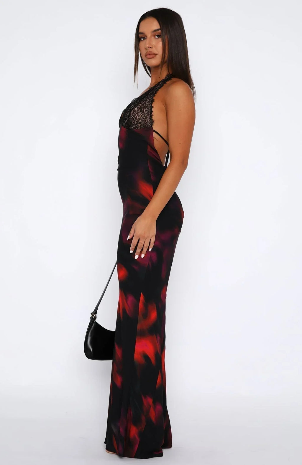 A women's floral print maxi dress featuring a lace halter neck and lightweight fabric for comfort and style.