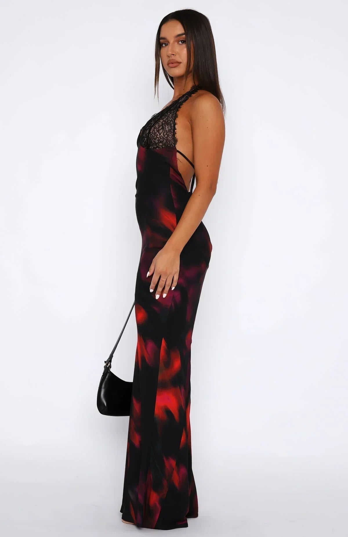 A women's floral print maxi dress featuring a lace halter neck and lightweight fabric for comfort and style.