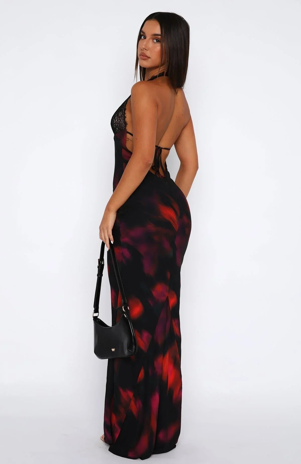 Women’s floral print maxi dress featuring a lace halter neck, crafted from lightweight fabric for comfort and style.
