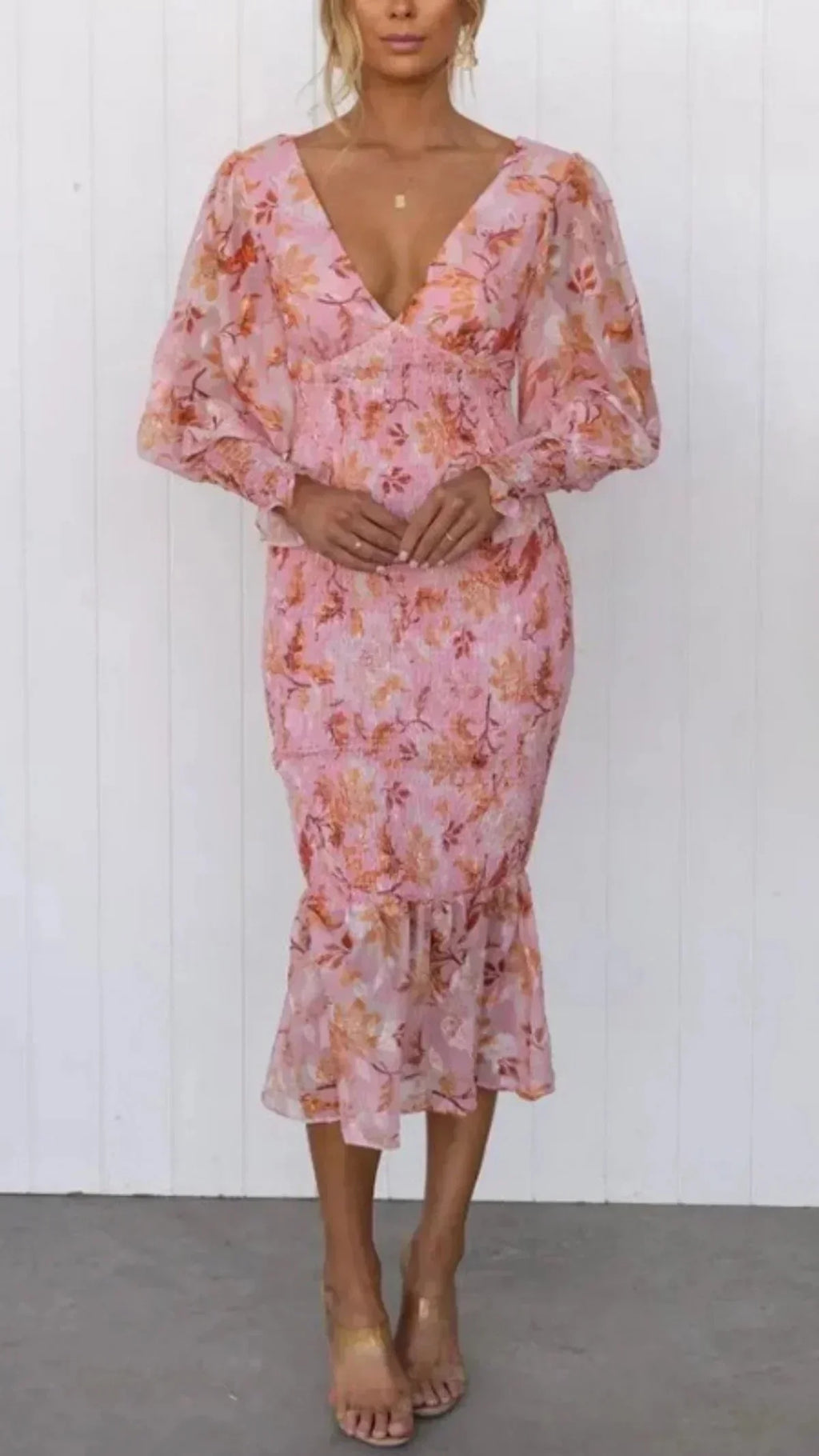 Women’s floral sheer midi dress with puffed sleeves, made from lightweight fabric, featuring a flowing silhouette and…