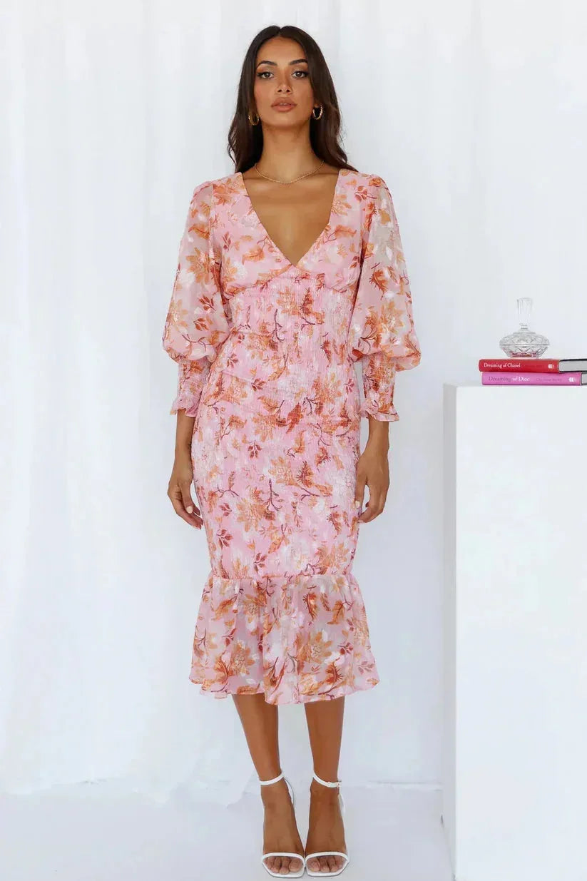 Floral sheer midi dress for women with puffed sleeves, lightweight fabric, and a flowing silhouette for a comfortable fit.