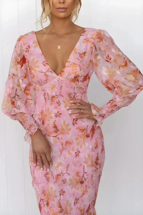 Women’s floral shear midi dress featuring puffed sleeves, lightweight fabric, and a flowy silhouette for a comfortable fit.