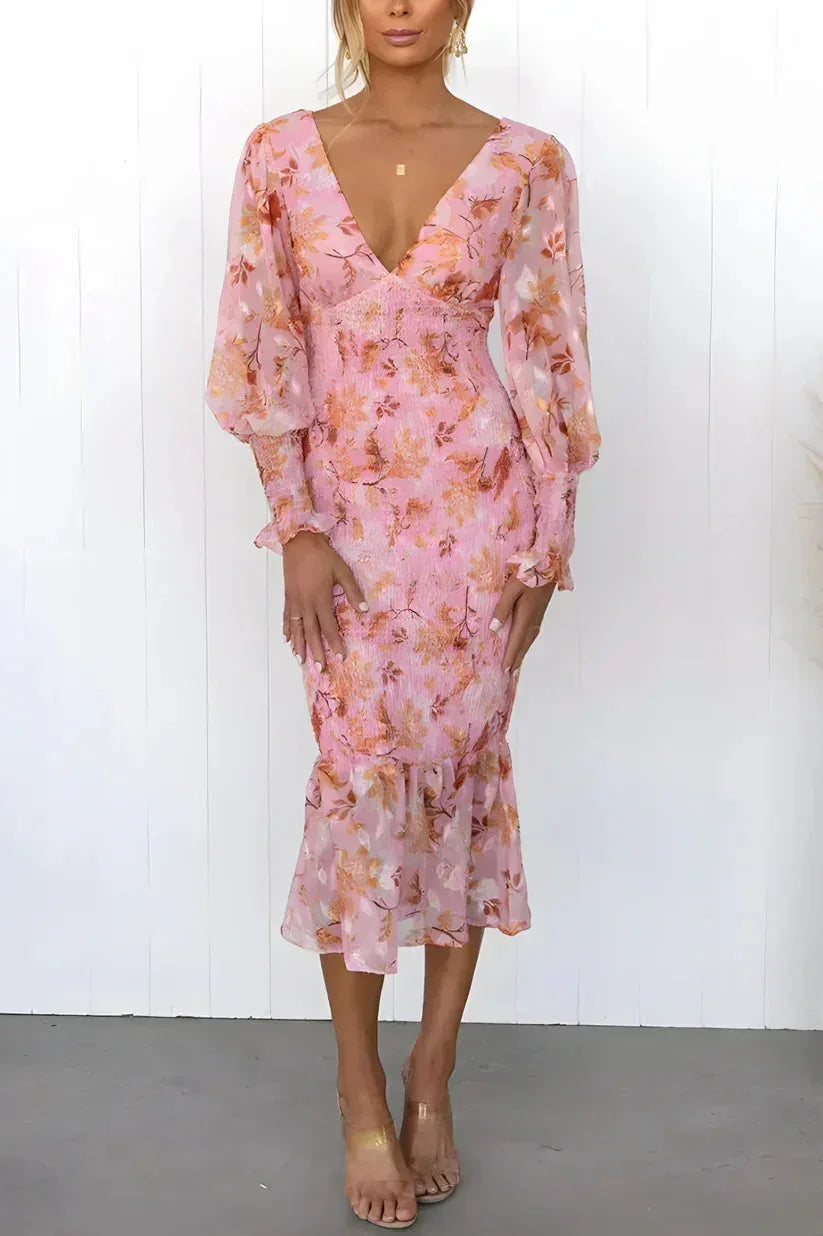 Pink floral shear midi dress for women featuring puffed sleeves and lightweight fabric, perfect for warm-weather outings.