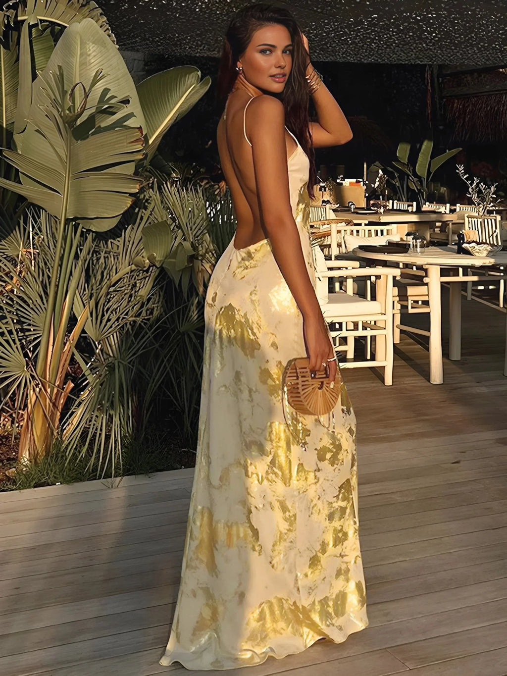 Gold satin maxi dress for women featuring foil details and adjustable straps for a stylish, elegant silhouette.