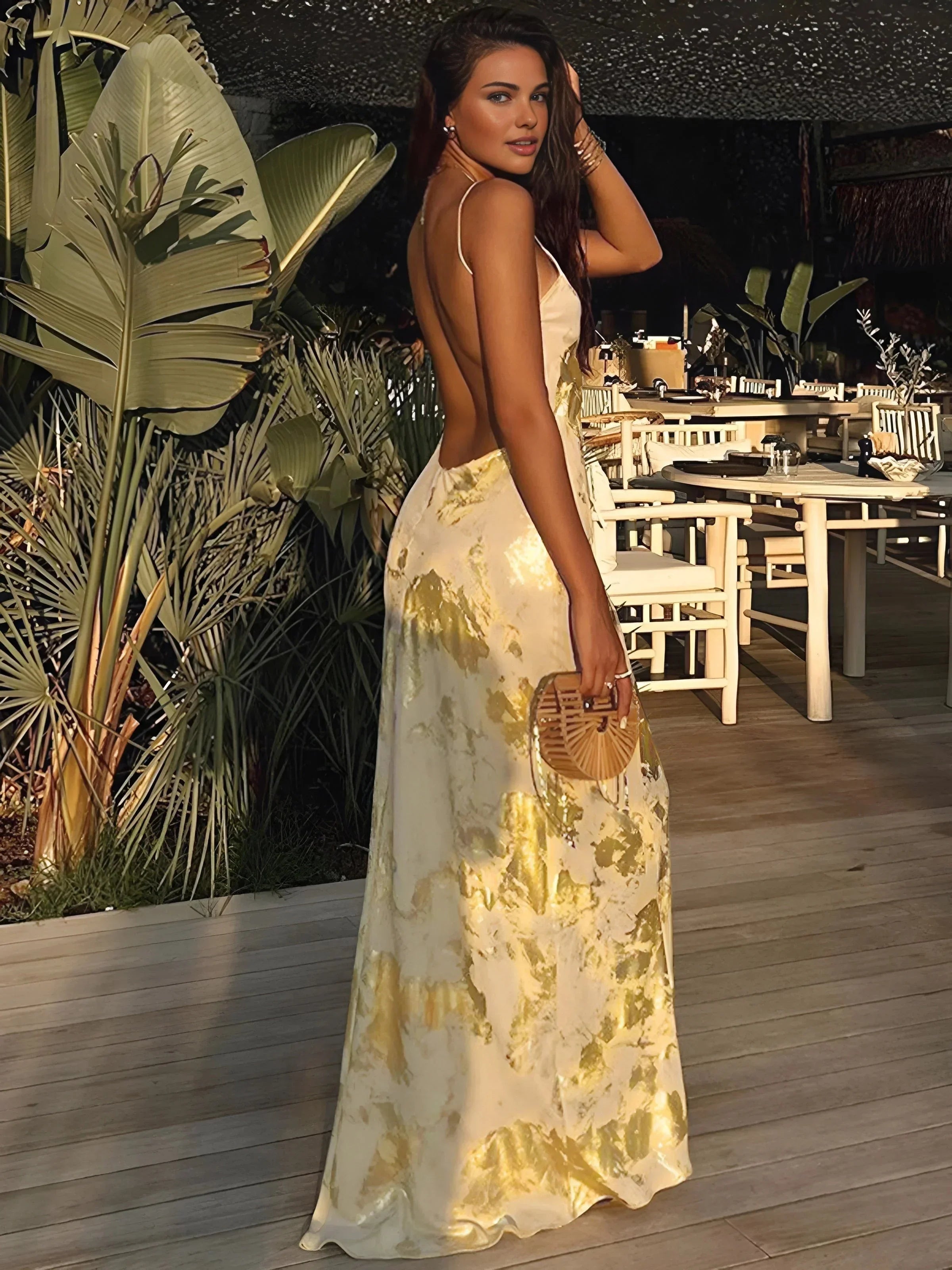 Gold satin maxi dress for women featuring foil details and adjustable straps for a stylish, elegant silhouette.