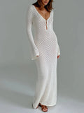 White long knit dress with tie front and flared sleeves, made from soft, breathable fabric for comfort and style.