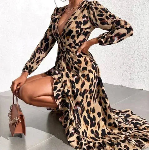 Women’s long-sleeve leopard print maxi dress with a wrap design and tie waist, made from soft, breathable fabric for comfort.