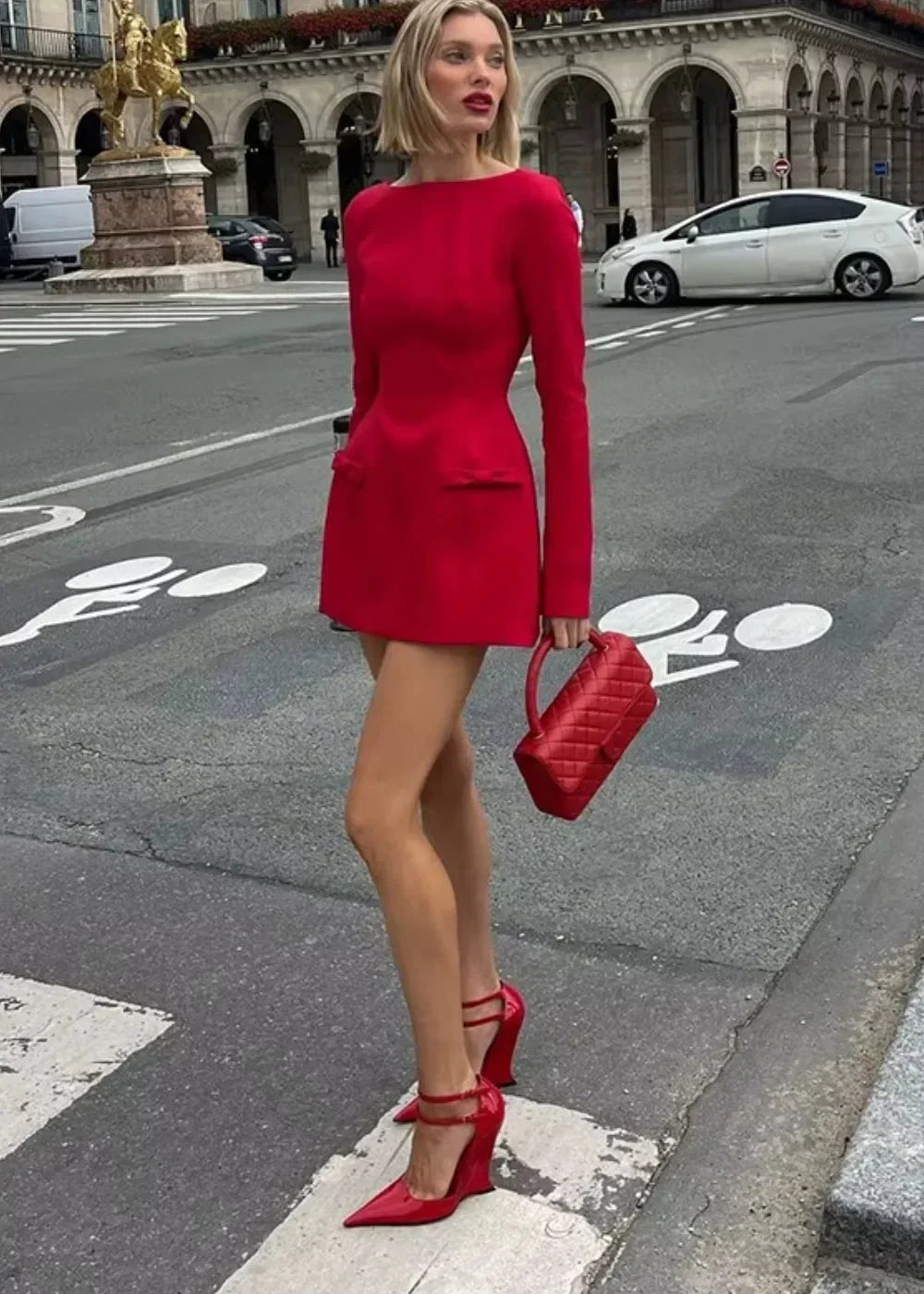 Women's long sleeve mini dress in soft fabric, featuring bow accents at the sleeves and a relaxed fit for everyday wear.