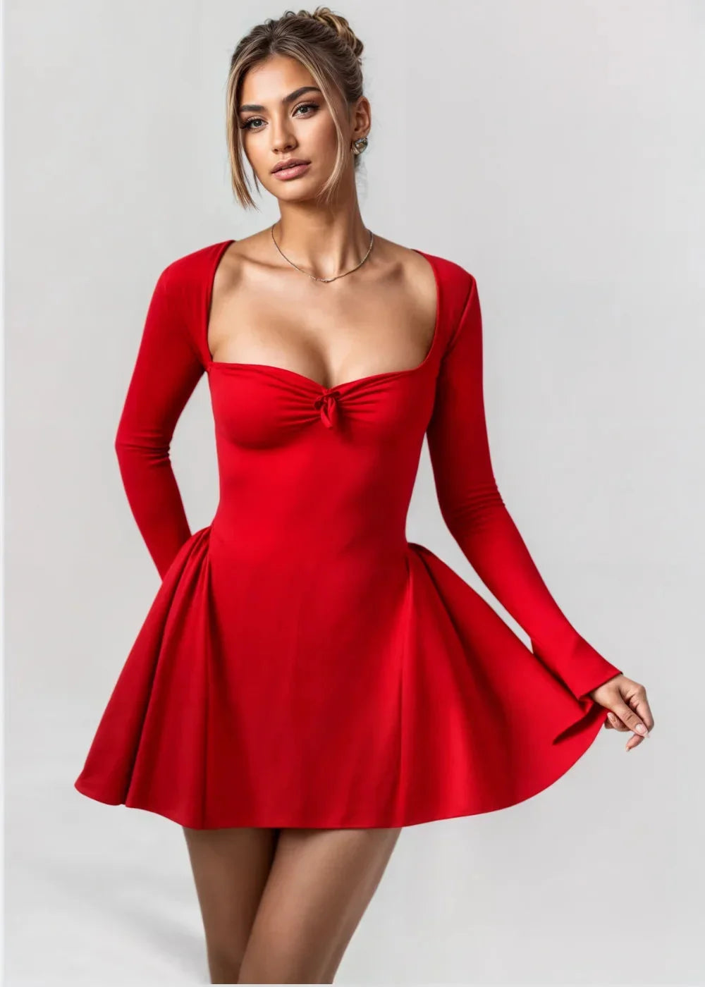 Women's long-sleeve mini dress with a sweetheart neckline, flared skirt, crafted from soft, breathable fabric for comfort.