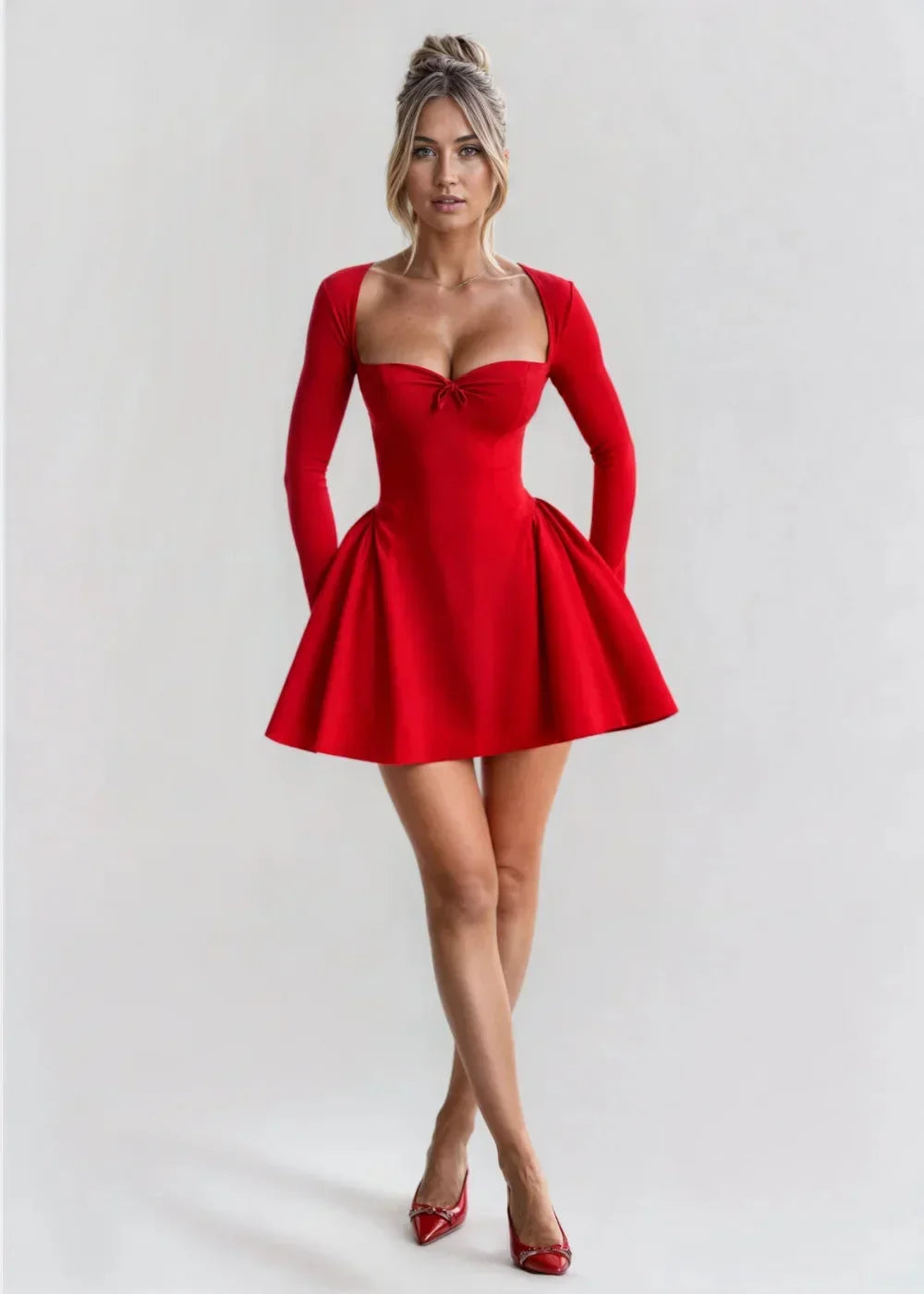 Red women's long-sleeve mini dress with a sweetheart neckline and flared bottom, made from soft, breathable fabric.