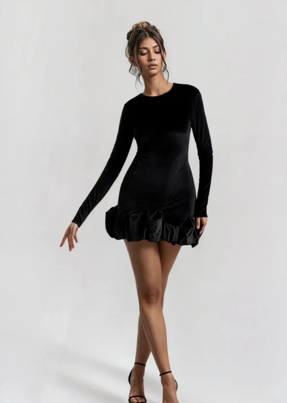 Women’s long-sleeve velvet mini dress featuring a ruffle hem, crafted from soft velvet for a stylish and comfortable fit.