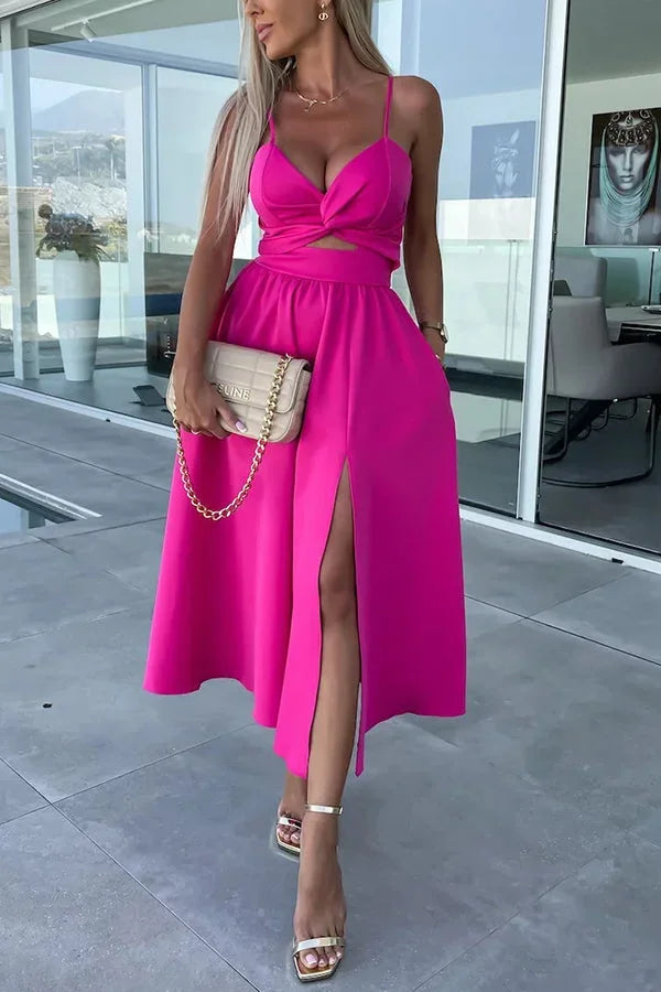 Women's midi dress featuring a cut-out waist, pocket design, and lightweight fabric, perfect for casual outings.