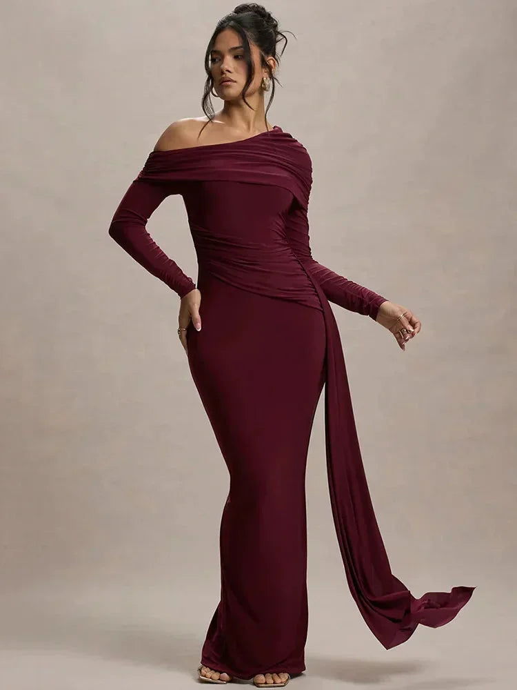 Women’s off-shoulder draped maxi dress in lightweight fabric featuring a flowing design and elegant silhouette.