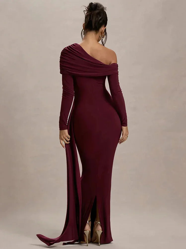 Women’s off-shoulder draped maxi dress in lightweight fabric, featuring a flowing design and elegant silhouette.