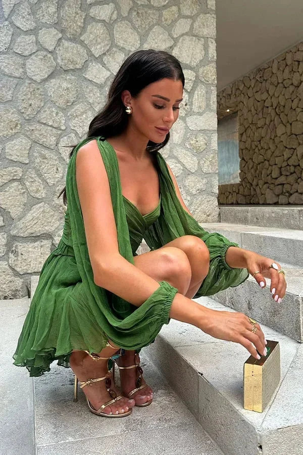 Purple women’s off-shoulder mini dress with ruffle detail, crafted from lightweight cotton for a comfortable, breezy fit.