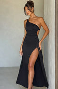 Black one-shoulder maxi dress made of soft fabric, featuring a thigh-high slit for added style and movement.