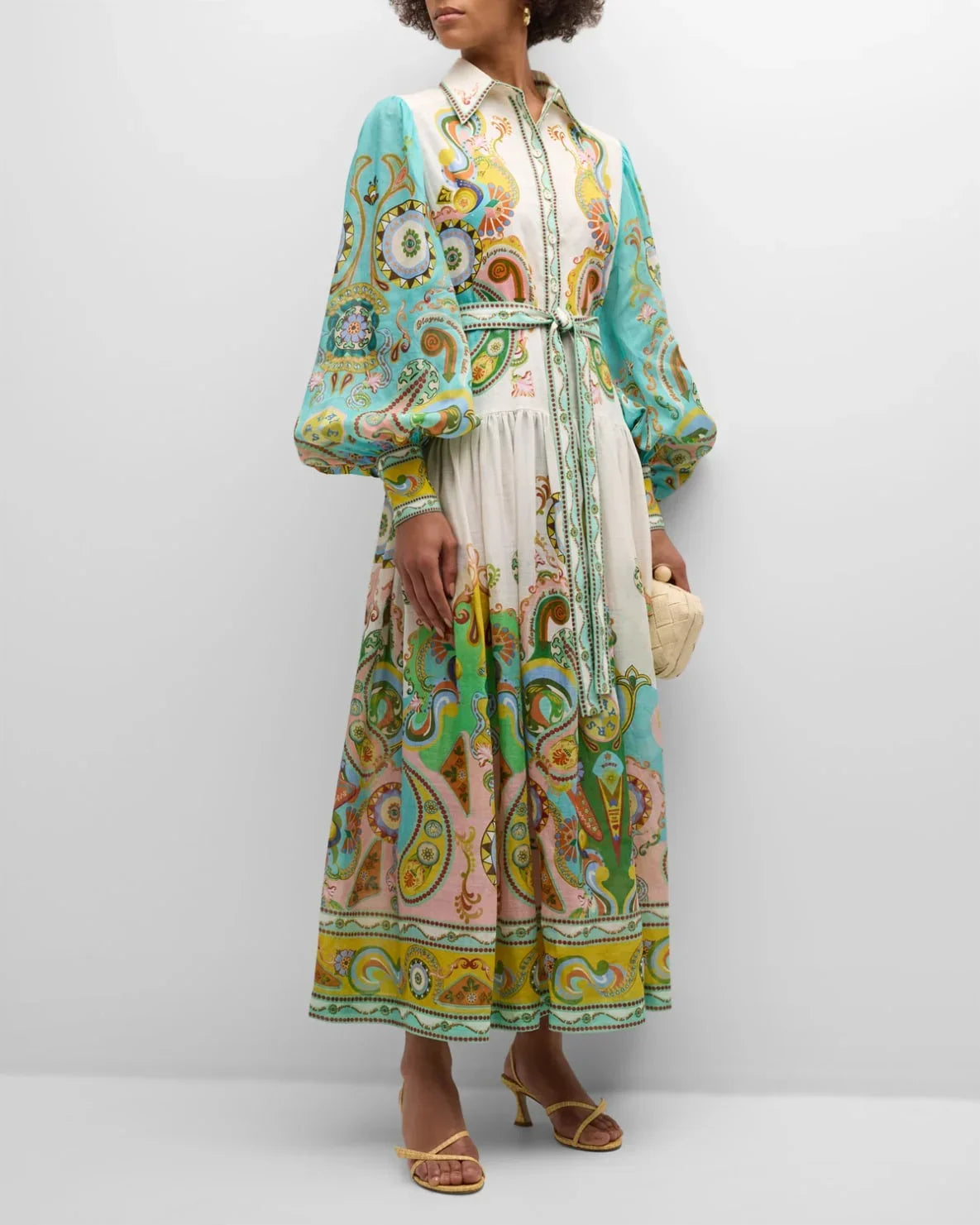 Women’s paisley print midi dress featuring balloon sleeves, crafted from lightweight fabric for comfort and style.