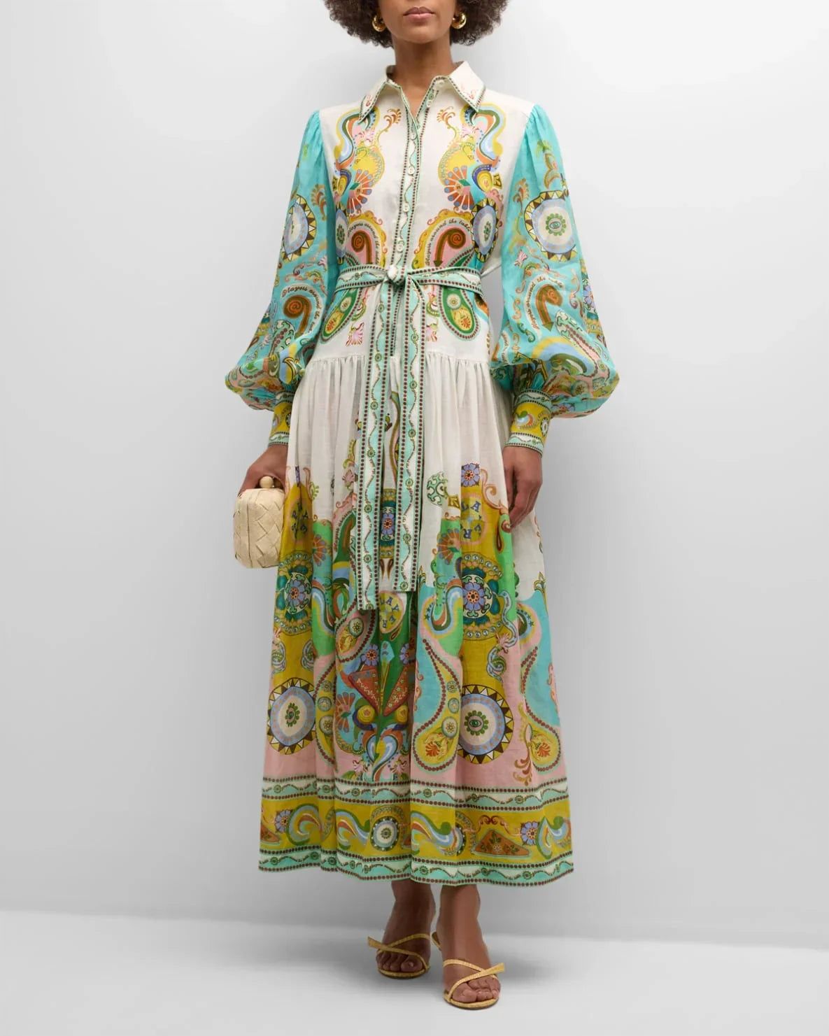 Women’s paisley print midi dress featuring balloon sleeves, made of soft cotton with a flowing silhouette and vibrant…
