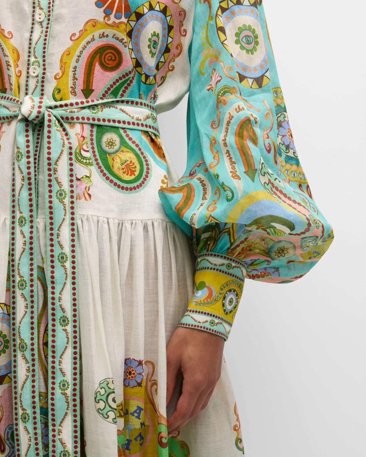 Women’s paisley print midi dress featuring balloon sleeves, soft fabric, and a flowing silhouette ideal for casual outings.