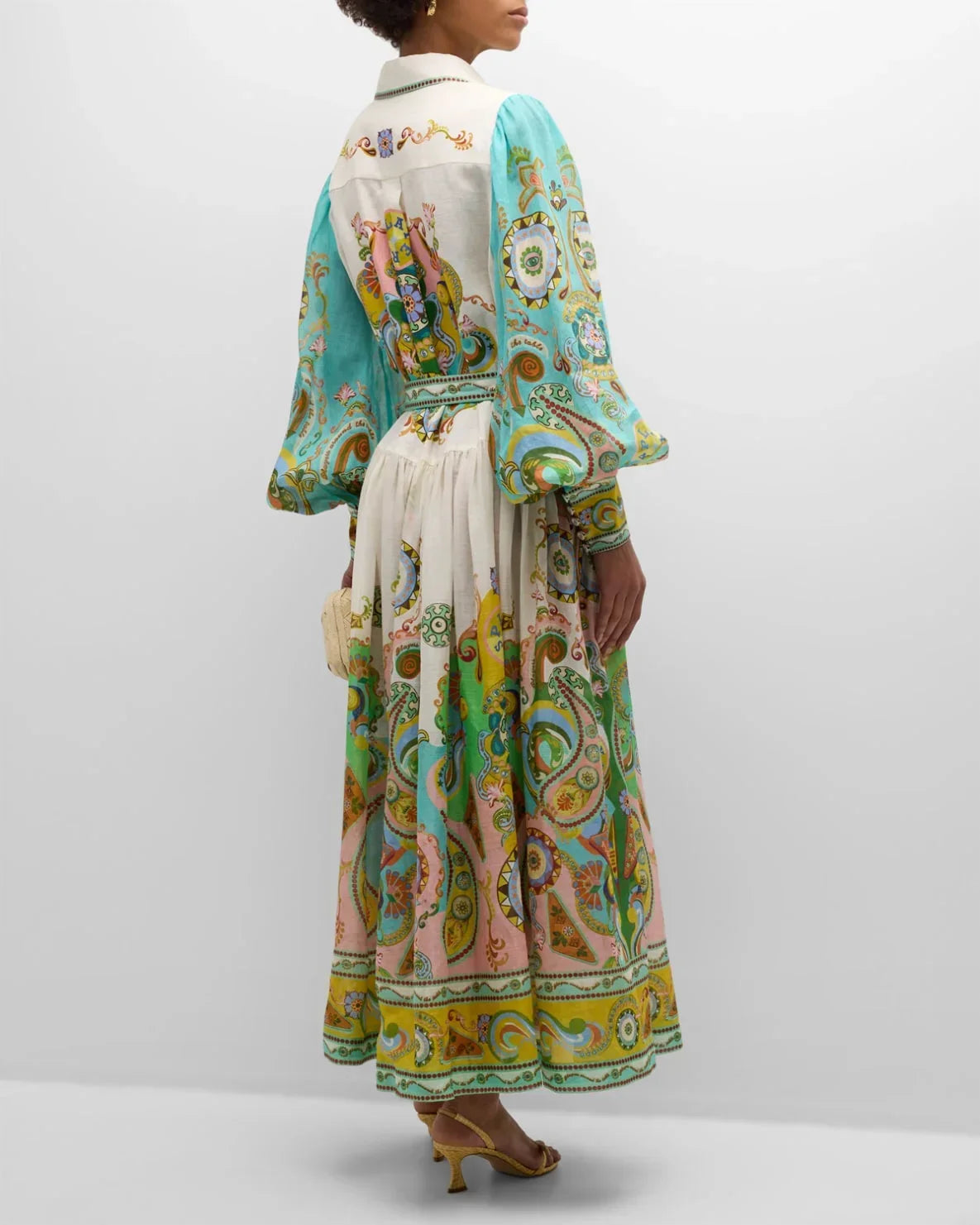 Women’s paisley print midi dress featuring balloon sleeves, made from soft, breathable fabric for comfort and ease of…