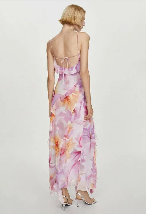 Women's pink floral asymmetric midi dress featuring ruffles, made of lightweight fabric for a flowy and comfortable fit.