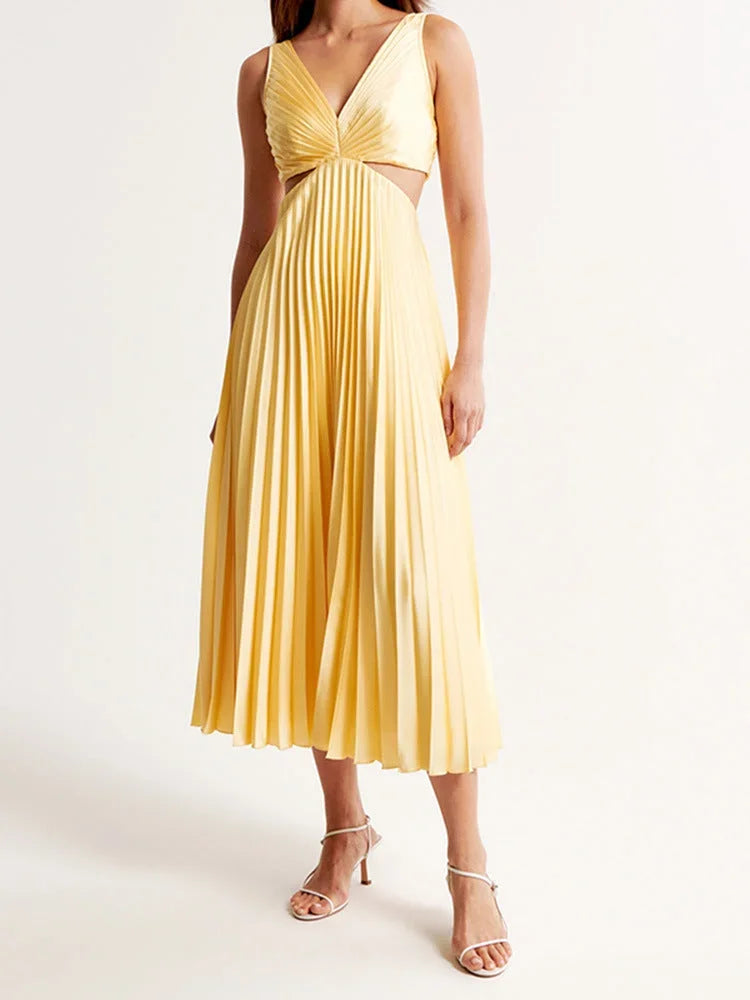 Women’s yellow maxi dress made of soft fabric, featuring pleats, cut-out detail, and a plunging neckline for an elegant look.