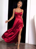 Red satin maxi dress for women, featuring spaghetti straps and a flowing silhouette, ideal for formal events or evening wear.