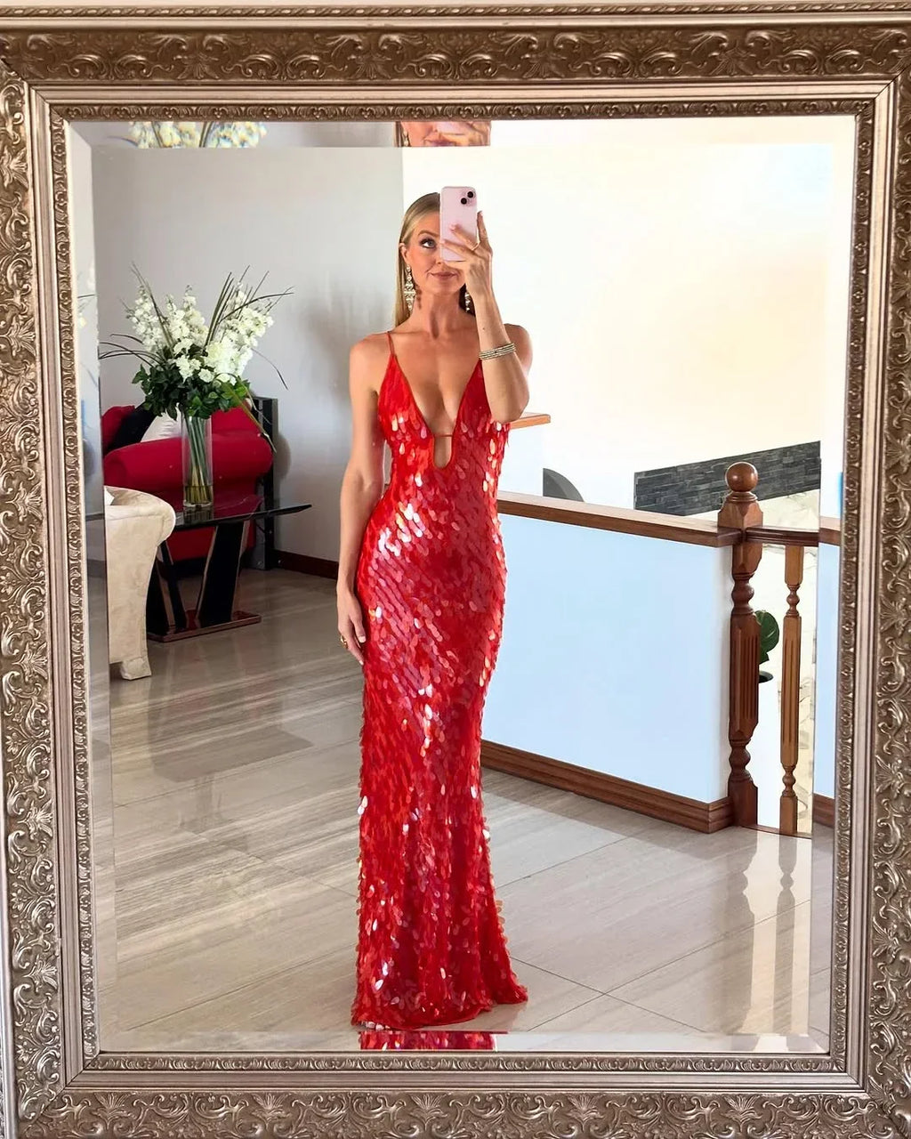 Red sequin maxi dress for women featuring a deep V-neck and a flattering silhouette, perfect for special occasions.