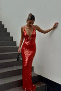 Red sequin maxi dress for women featuring a deep V-neck and a flowing silhouette, perfect for formal events.