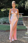 Pink satin maxi dress featuring a V-neck design and a thigh-high slit, perfect for elegant occasions and comfortable wear.
