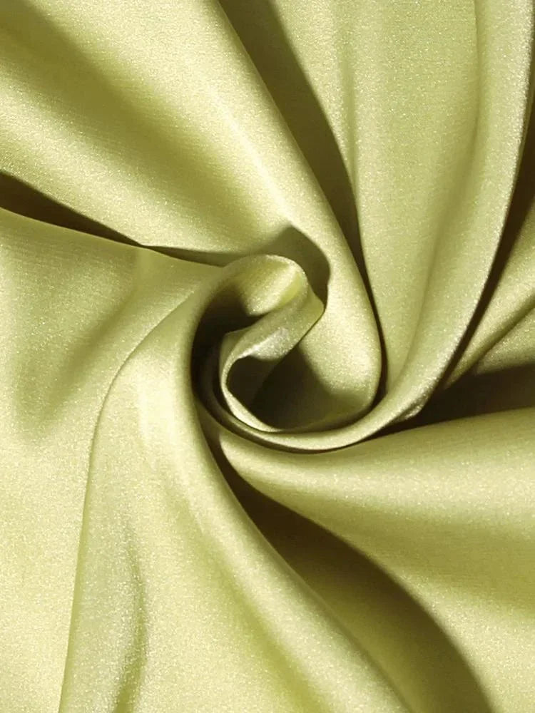 Women’s satin mini dress featuring chain details, a sleek silhouette, and a smooth, shiny finish perfect for evening wear.