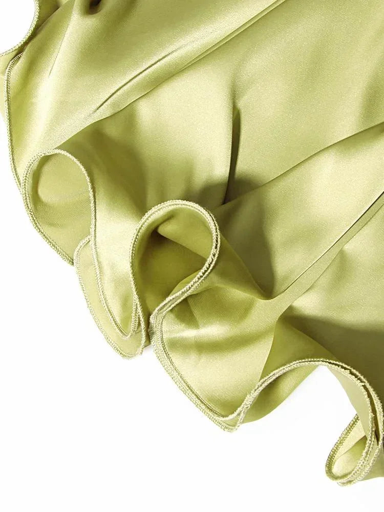 Women's satin mini dress featuring chain details, designed for a stylish look with a smooth finish and a fitted silhouette.