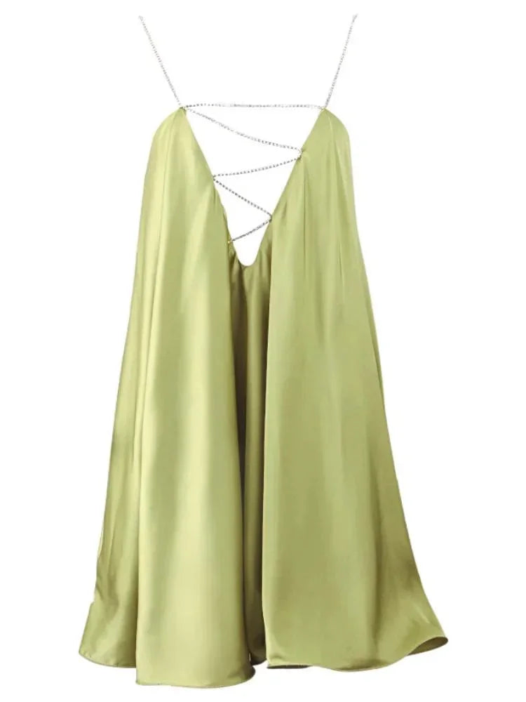 Women’s satin mini dress featuring delicate chain details, offering a sleek silhouette and smooth texture. Perfect for…